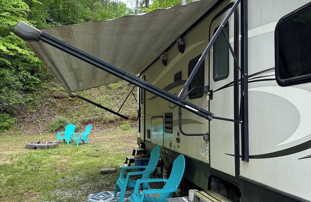 Waterfall view cozy camper