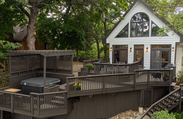 Cozy Lakehouse Views on a hill, Hot tub, water activities, pier, & optional boat