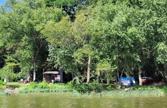 Cottage rustique au bord de l'eau avec kayaks et canoë gratuits