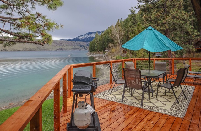 Waterfront dog-friendly home with lake view, private dock, deck, fireplace