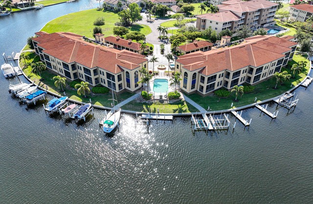 Waterfront First Floor End Unit Condo in Punta Gorda Isles. Welcome to Paradise!