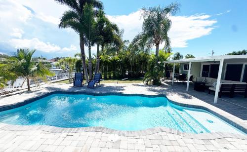 Waterfront Getaway with Pool, Dock & Kayaks