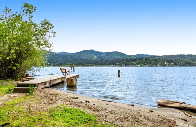 Waterfront home on Lake Whatcom with private dock, beach, firepit & woodstove