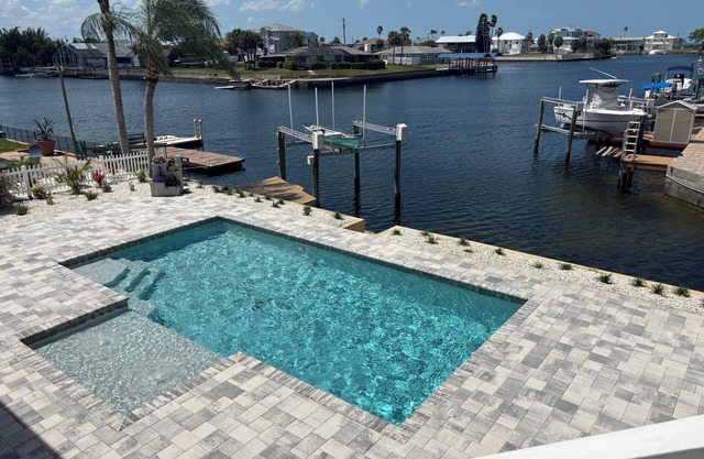 Waterfront home & beautiful pool