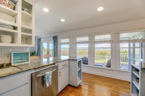 Waterfront Home with Screened Porch and Sunsets