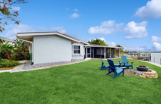 Waterfront home with amazing views, private patio, firepit, AC, & W/D