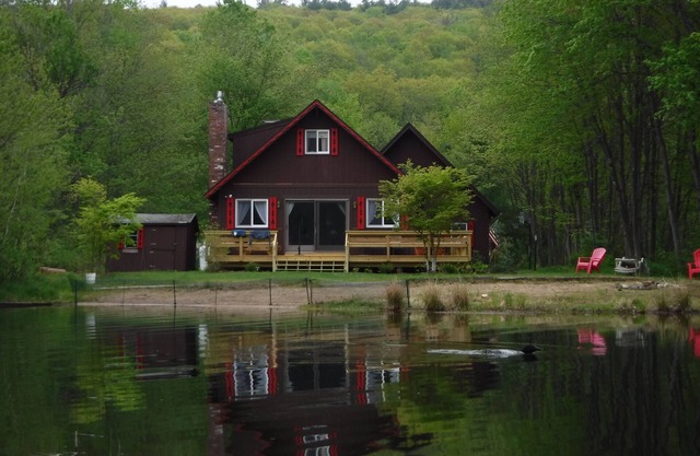 Maison au bord de l'eau avec plage privée