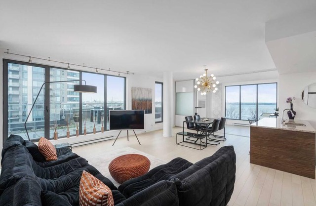 Waterfront penthouse with 1000 square feet patio