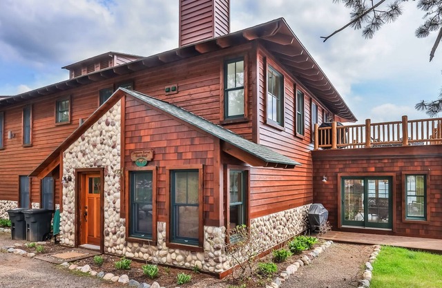 Waterfront resort condo with private dock, 4-season porch, seasonal pool & grill