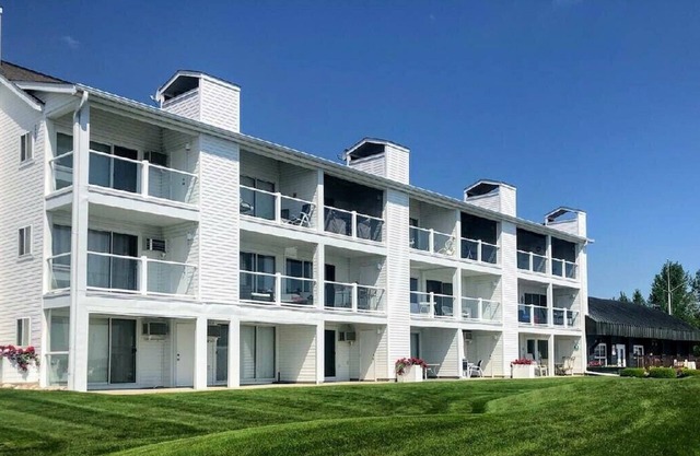 Waterfront Setting w/ Top-Floor Views Overlooking Lake Charlevoix