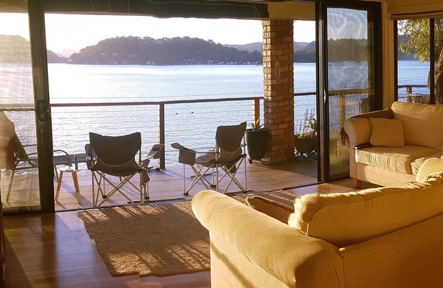 Waterfront! Stunning boat access only home. Deep water jetty. Sunset views