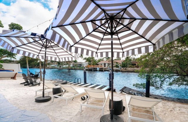 Waterfront w/ Beach Htd Pool Cinema Game-Room Spa