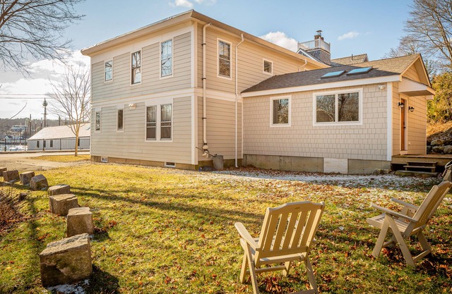 Waterfront, walkable, updated home with harbor views & partial AC