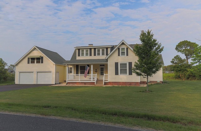 Welcome to The Cove - a spacious 6-bedroom house located in charming White Stone