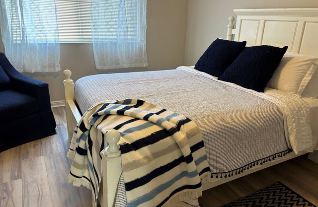 Welcome to this haven that seamlessly blends modern comfort with classic charm.