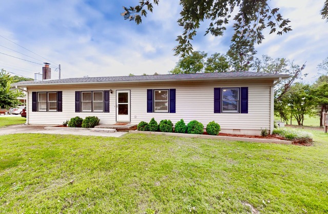 Well-located home in town with sunrise views, deck & great backyard