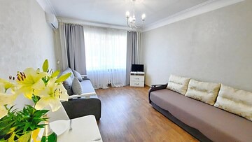White rotunda. Apartment with a view. Alex Apartments