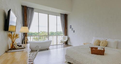White Wall Riverfront Hotel