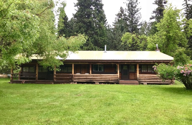 Chalet en rondins avec accès au lac dans un magnifique cadre boisé