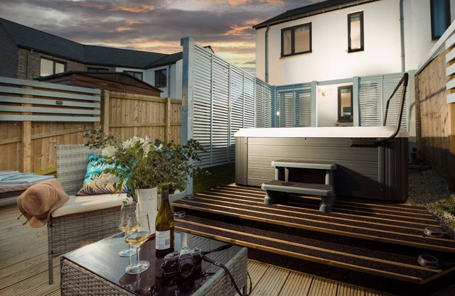 Wish You Were Here - A two-bedroom house with an enclosed garden, hot tub and open plan living just