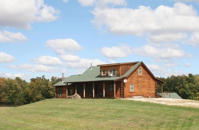 Magnifique maison en rondins de chêne sur le fleuve Mississippi