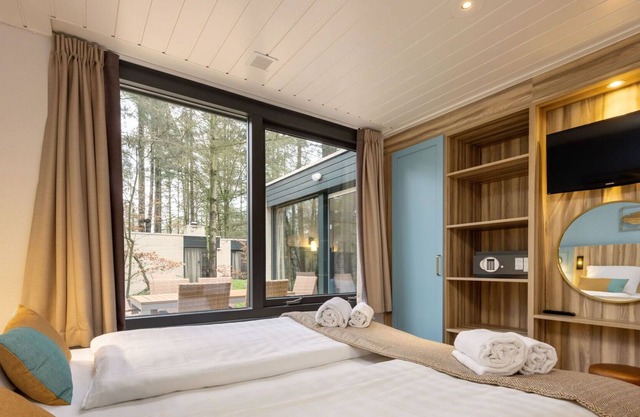 Confortable appartement pour 6 personnes avec WIFI, piscine, bain à remous, TV et parking