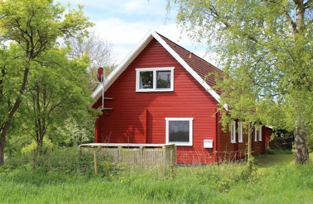 Maison jumelée en bois, idéale pour 2 familles