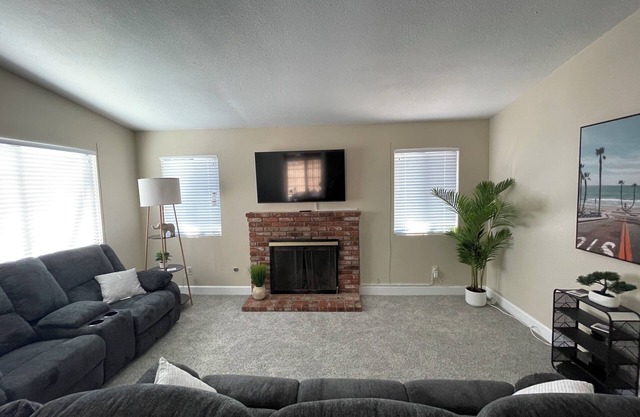 5 min drive from The Blvd. Family sized home with a Pool, Spa and built in BBQ!