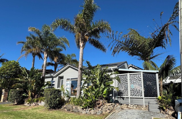 Your coastal escape. Walk to the beach. Private spa, whole house access.