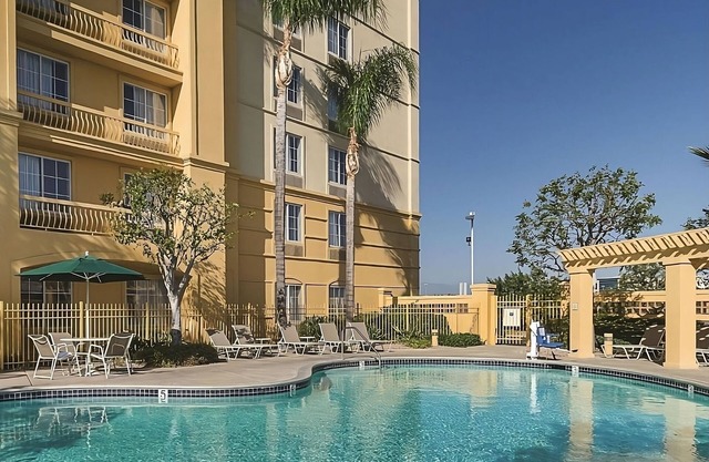 Your Home Away From Home! Amazing unit w/ Pool access Near Toyota Arena!