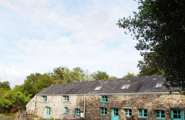 Au bord du parc national des Brecon Beacons, Ysgubor Glyn est une grange rénovée pleine de style et de q