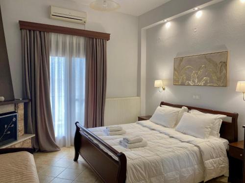 Loutraki Maison | Ξενώνας Ρόδον