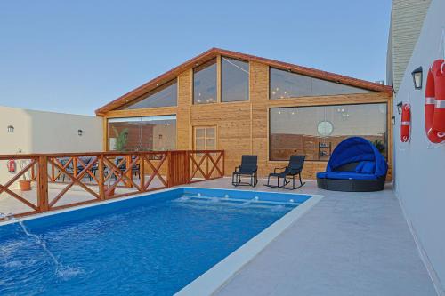 Dhahban Chalet De Ski | منتجع سي فيو - sea view cottages