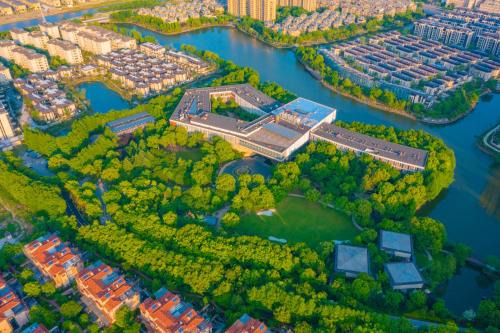 Nanxun Qu Hôtel | 南浔花园名都大酒店