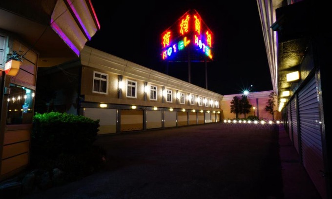 Wuqi District Hôtel | 荷村 Motel