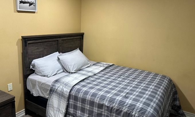 Brampton Maison | 1 bedroom basement suite with spacious living room and laundry, no kitchen.