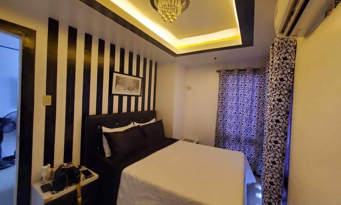 Paco Copropriété | 1-bedroom condo in brilliant Manila with AC, fitness room, WiFi