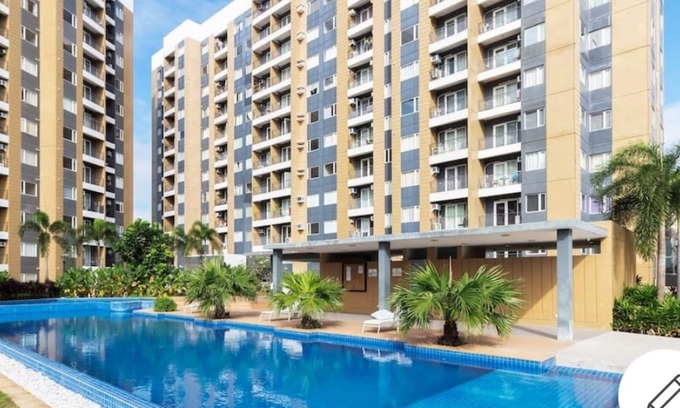 Taytay Copropriété | Condo 1 BR intérieur avec WIFI, télévision par câble, douche chaude à Taytay - The Hive Resort