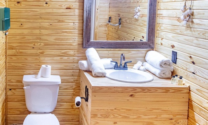 Ramer Maison | 1bd rm, 1 bth, hotel style cabin w/ Mini fridge, micro, & tv, at Kick Back Ranch