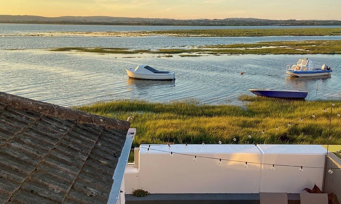 Llanrhidian Higher Cottage | Picked for its stunning estuary location with sea views and restaurants in walking distance.