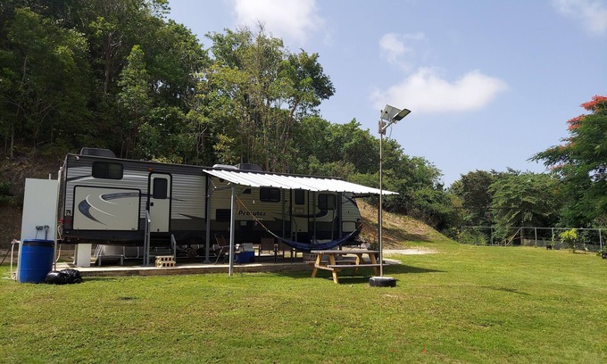 Aguadilla Maison | 2 bedroom camper, minutes from Aguadilla & Isabela beaches with AC and comfort.
