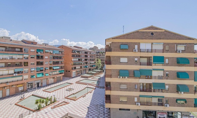 Chana Appartement | 2-Bedroom Retreat with Terrace in Granada - Steps from Metro and Bus