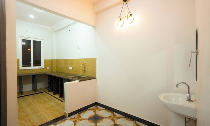 Sigra Maison | 2 bedroom set with 5 seater sofa in living room, WIFI, AC in Varanasi city.