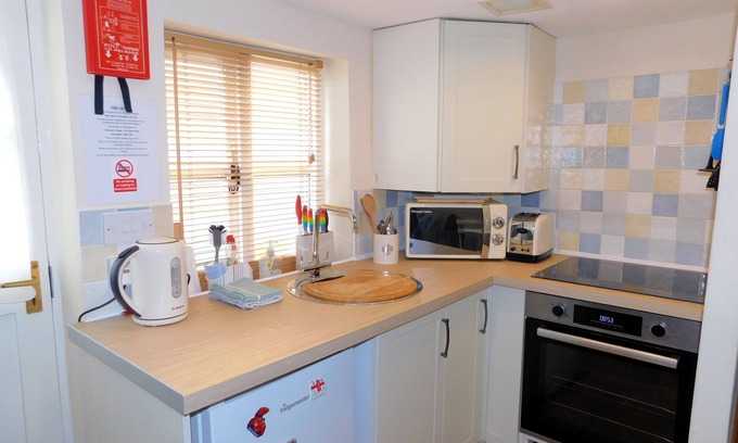 Sheringham Cottage | 2 Museum Cottages - cottage traditionnel en pierre, une retraite romantique et chaleureuse au coeur de Sheringham,