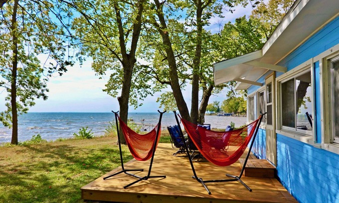 Isle Cabine | 2BR Cabin on Lake w/ Beach, Boat Dock in Protected Channel, & 74ft Viewing Dock