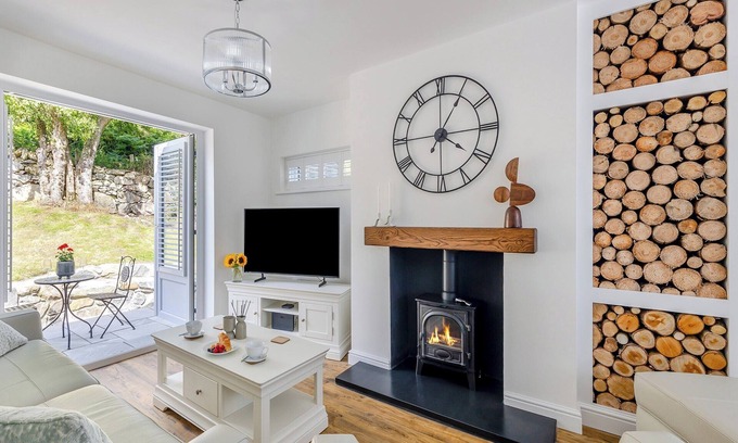 Brynrefail Cottage | This charming cottage boasts lovely views, stylish interiors, and easy access to walking trails.