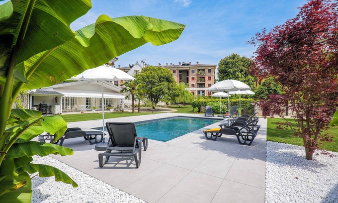 Intra Appartement | 3½-room apartment with pool and balcony in a sunny location
