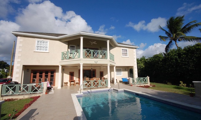 Gibbs Bay Villa | 4 Chambres Style colonial Villa dans un cadre privé, à quelques pas de la plage