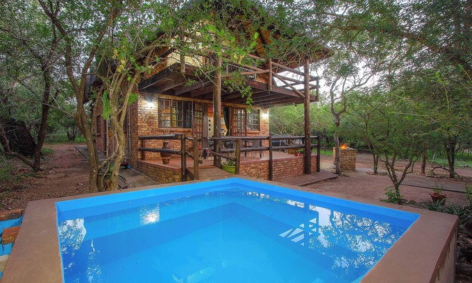Marloth Park Maison | 4-bedroom, 4-bathroom house in Marloth Park with WiFi and AC. Enjoy your stay
