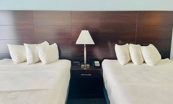 Cuero Maison | 4 Double Queen at FairBridge Inn & Suites Cuero, Free Parking!